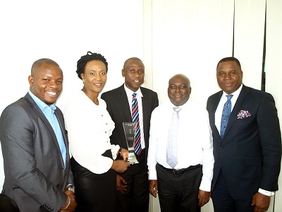 L-r:  Oladipo Omogbenigun (Clickatell) Folusho Akingbade (GT Bank) Adeyemi Atanda (GT Bank) Deji Oguntonade (GT Bank) Samson Isa (Clickatell) at the award handover